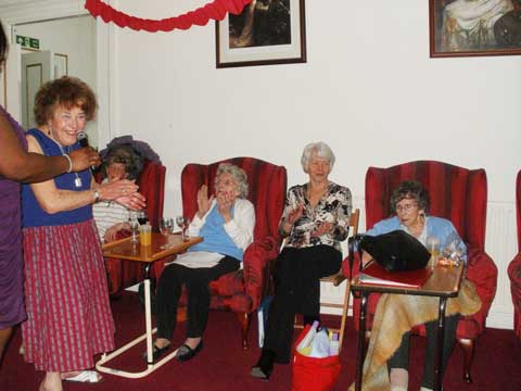 wider view of same group interacting with one another